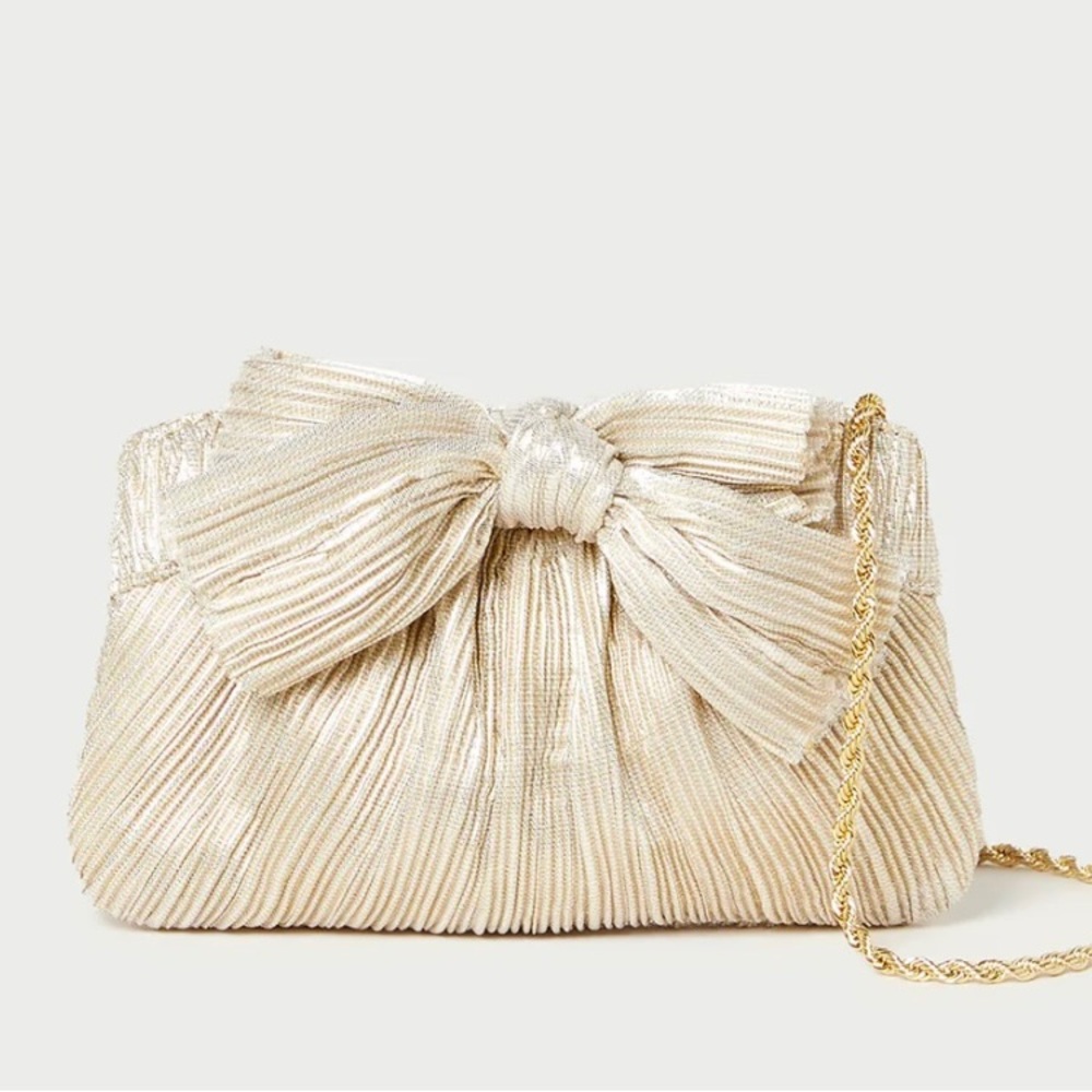 New Loeffler Randall Rochelle mini bow clutch in platinum